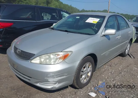 2002 Toyota Camry Le from USA, damaged, VIN 4T1BE32K42U504553